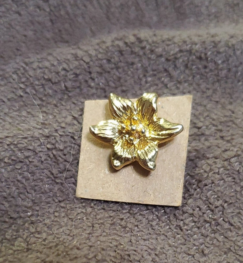 Goldtone carnation flower pin with raised petals and small gem center