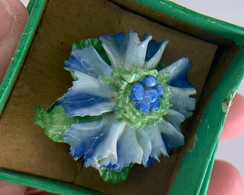 Blue porcelain carnation pin brooch with layered floral petals in vintage style