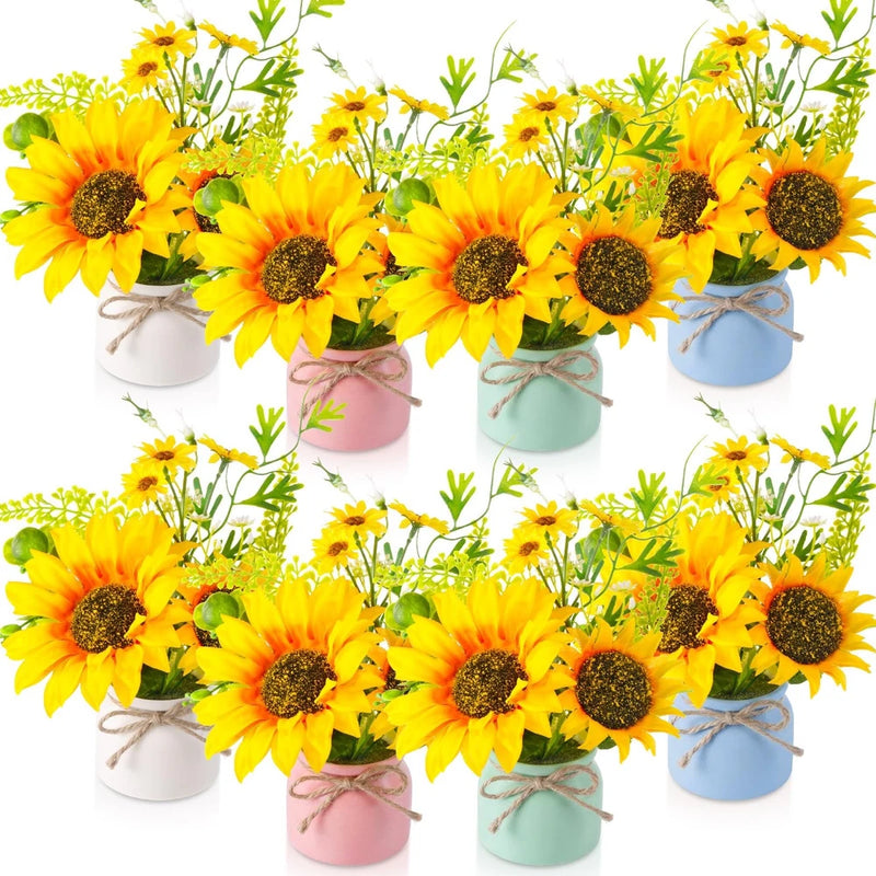 Artificial sunflower arrangement in small pastel pots with bright yellow blooms and green stems