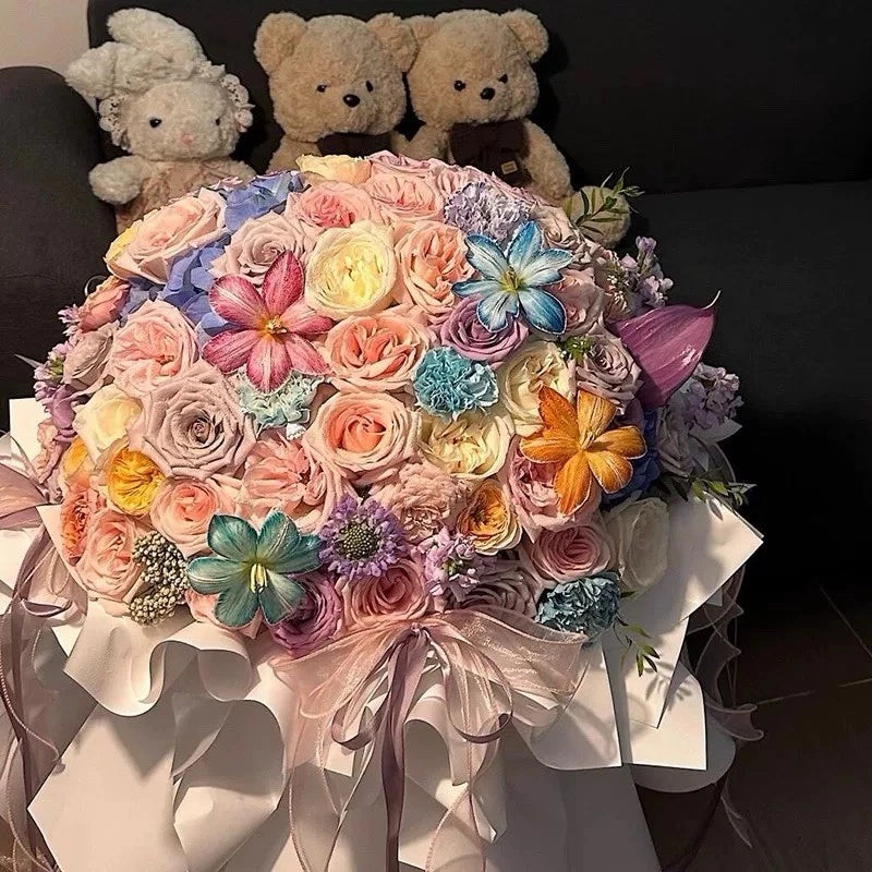 Colorful floral bouquet with pink and pastel roses and butterfly accents, ribbon bows