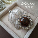 Red Tokachi stone, silver filigree brooch/obi clasp, flower design, sunflower, Sunflower
