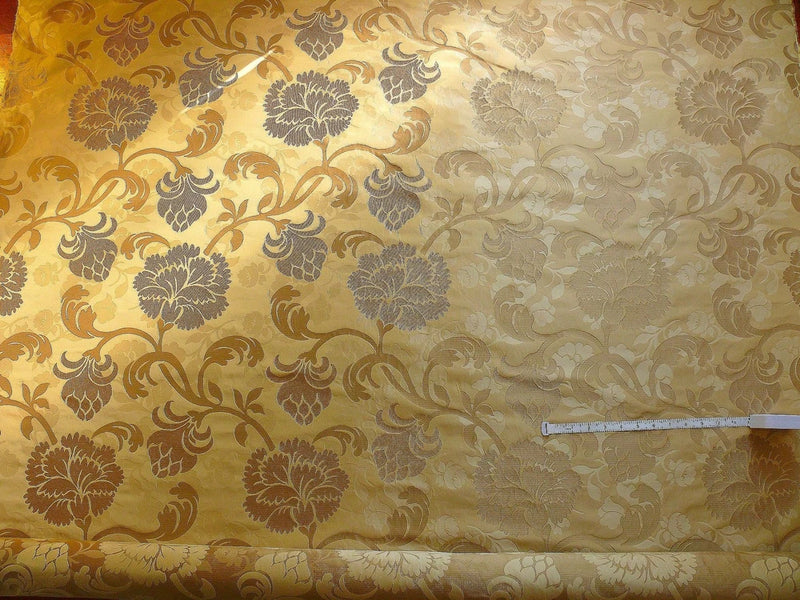 Reversible silk lampas fabric swatch with ornate gold, cream, and floral scroll pattern