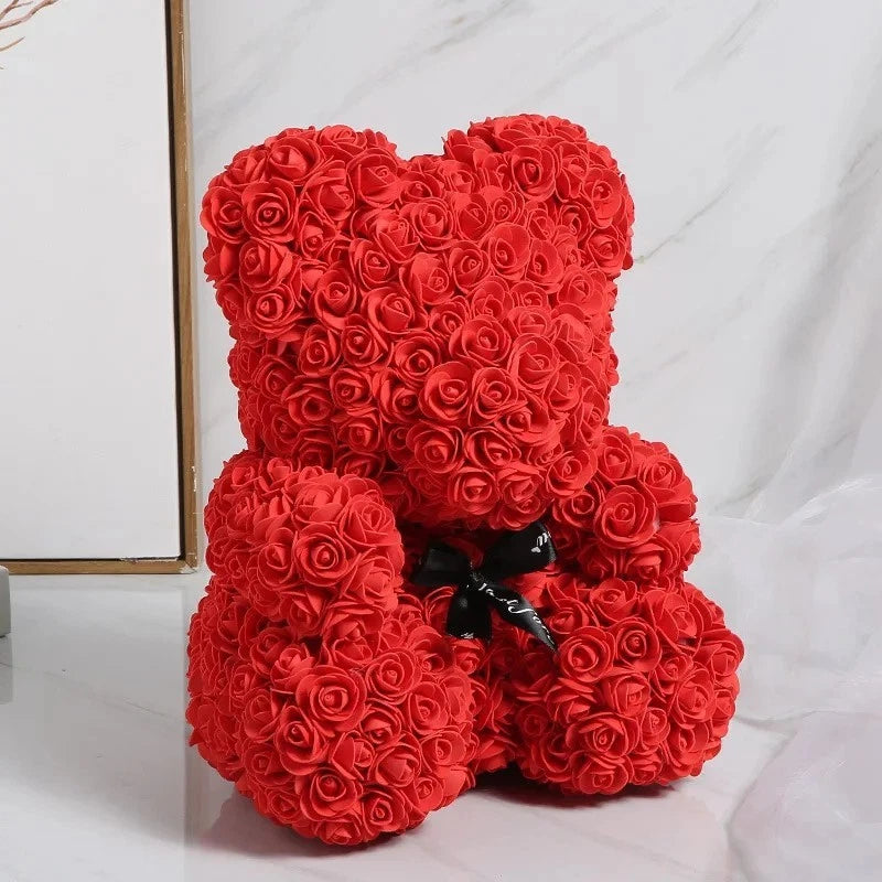 Red rose-flower teddy bear with black bow ribbon