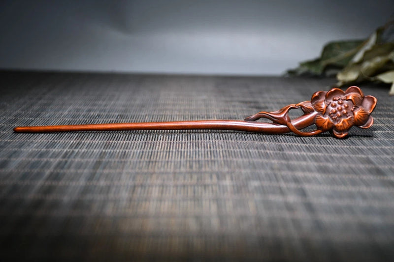 Peony flower hairpin with copper-toned bloom and leafy accents