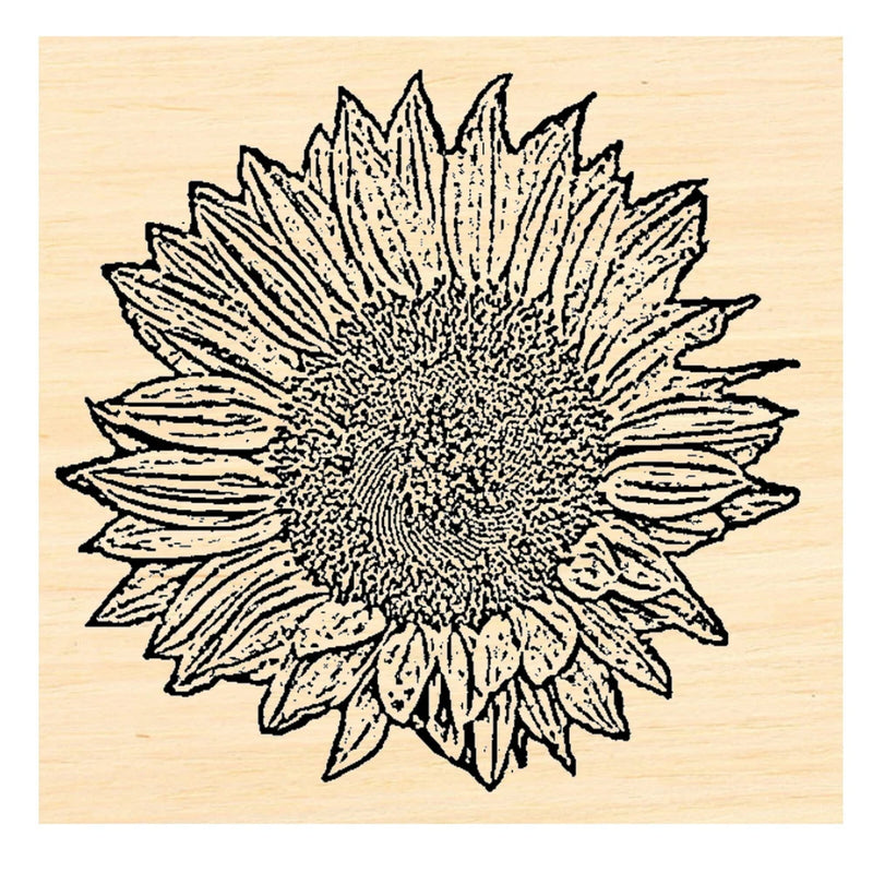 Sunflower rubber stamp with bold black flower design on light wood base