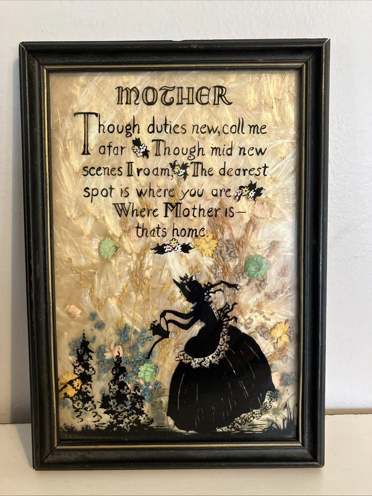 Framed dried flower silhouette picture with Victorian lady in black, “Mother” script