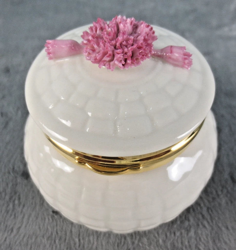 Belleek covered trinket box with white porcelain, gold rim, pink floral knob
