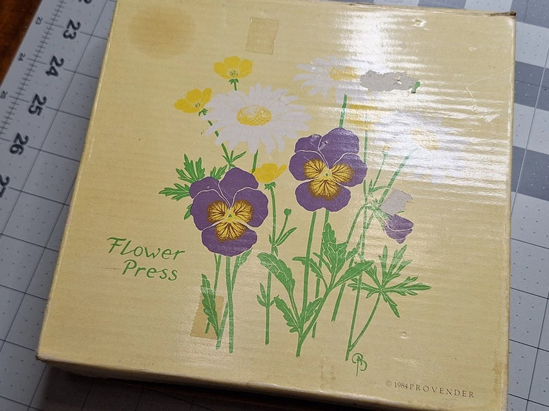 Flower press gift box with purple and yellow wildflower illustration