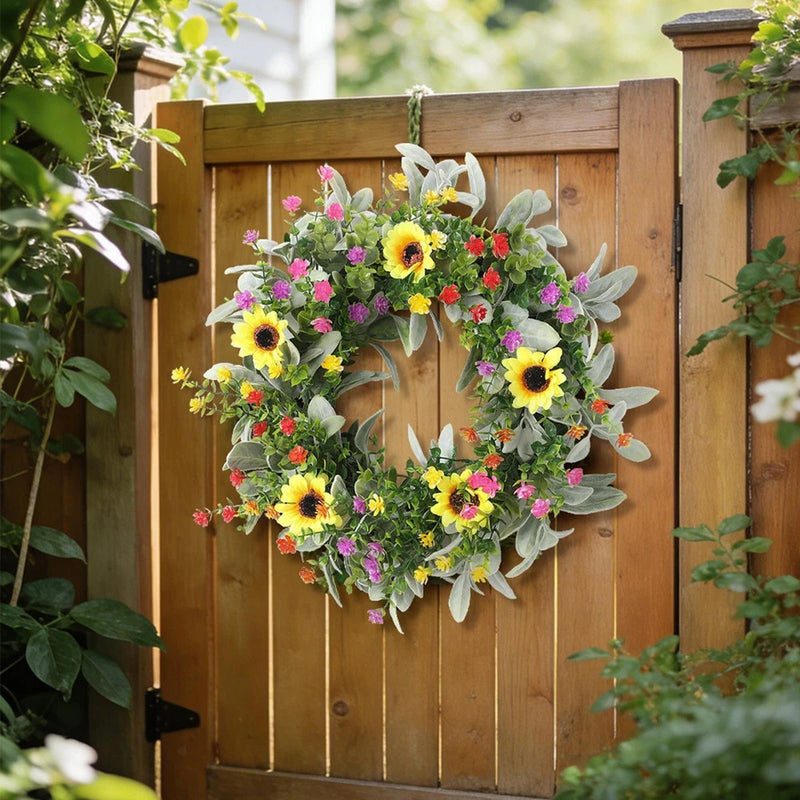 Artificial spring wreath with sunflowers and mixed wildflowers, round green foliage