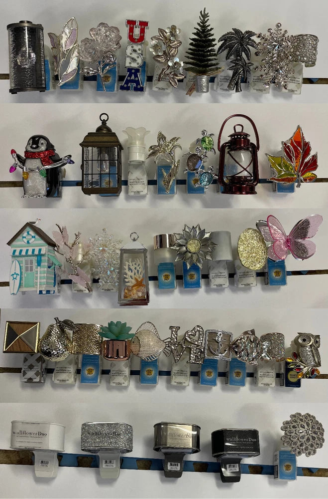 Decorative wall plug-in fragrance scent holders with blue bases, assorted designs