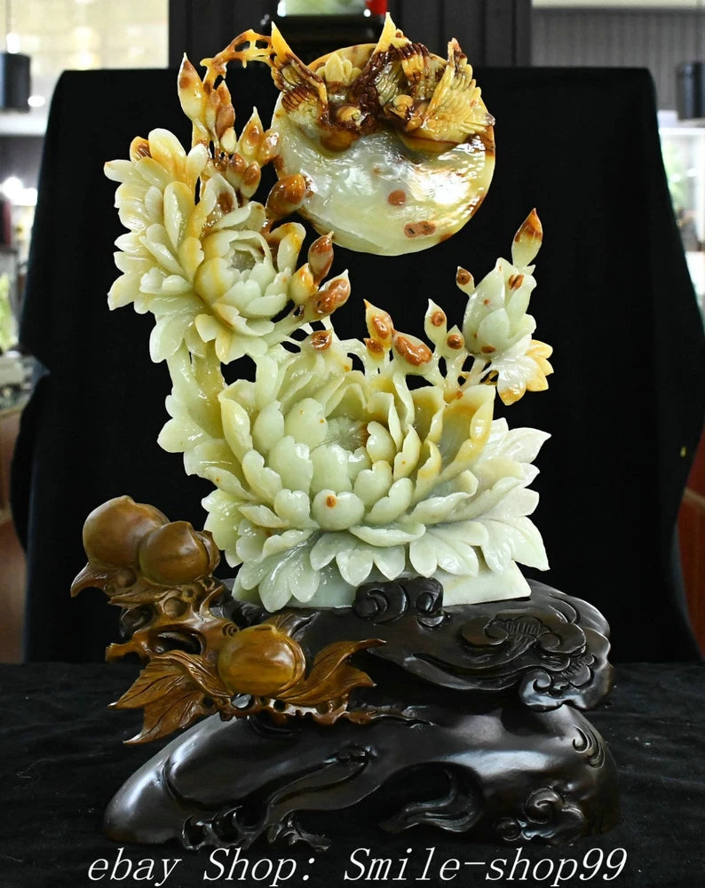 Carved jade peony flower statue with magpie bird, dark ornate pedestal base