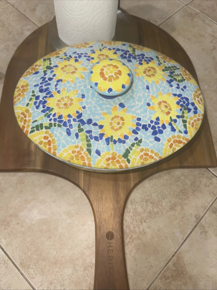 Round hand-painted mosaic dish lid with sunflower pattern in yellow and blue.