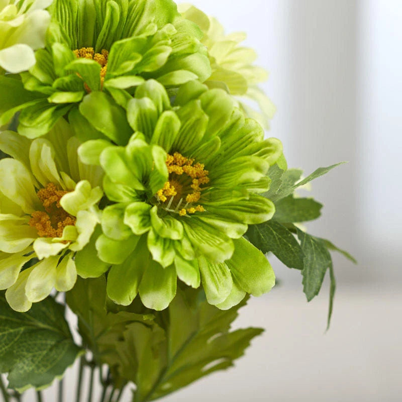 Artificial green zinnia floral bush with clustered light-green blooms and dark green leaves