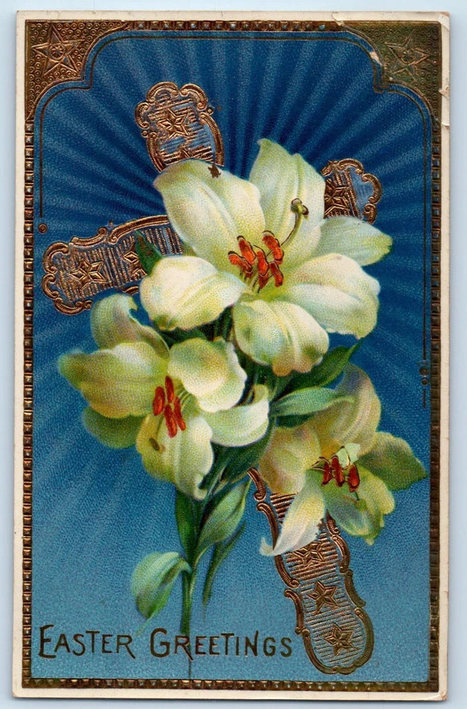 Vintage Easter postcard with lilies and gold cross, blue background, “Easter Greetings” text
