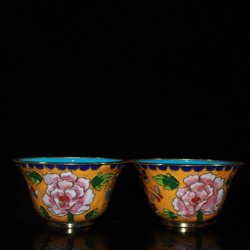 Pair of cloisonné peony bowls with pink flower motifs and gold bodies