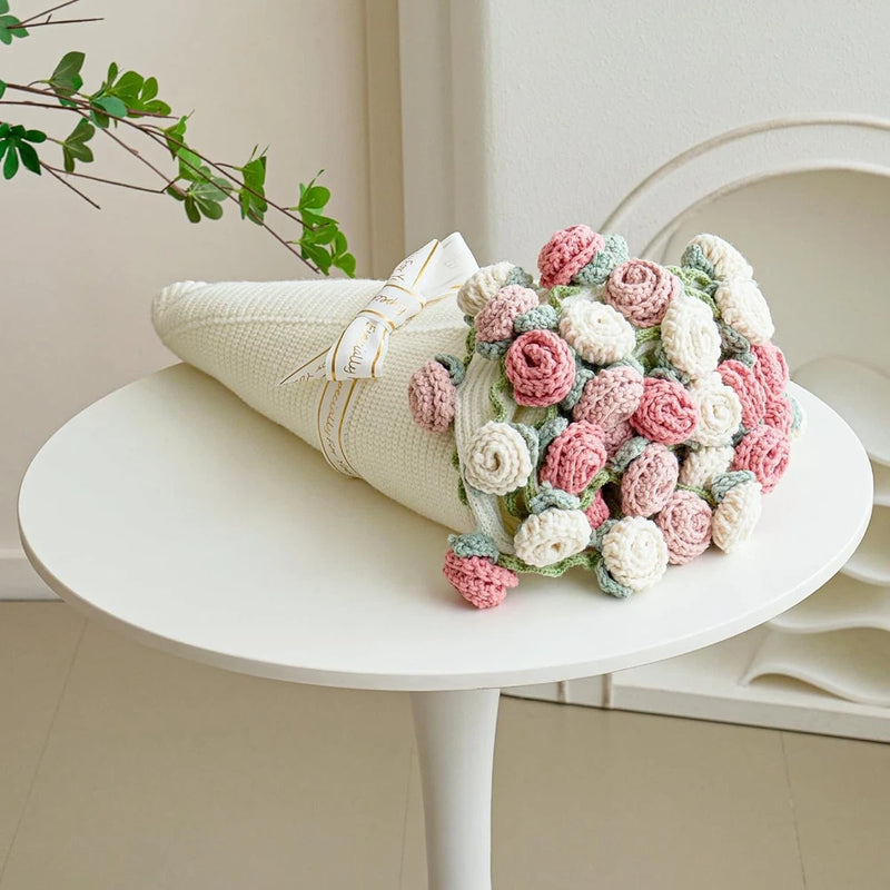 Handmade crochet flower bouquet throw blanket with pink and white rosette blooms