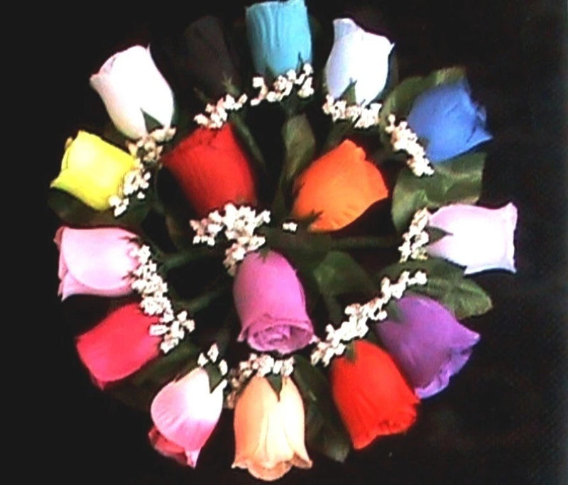 Multicolor rose boutonniere corsage with white baby’s breath and green leaves
