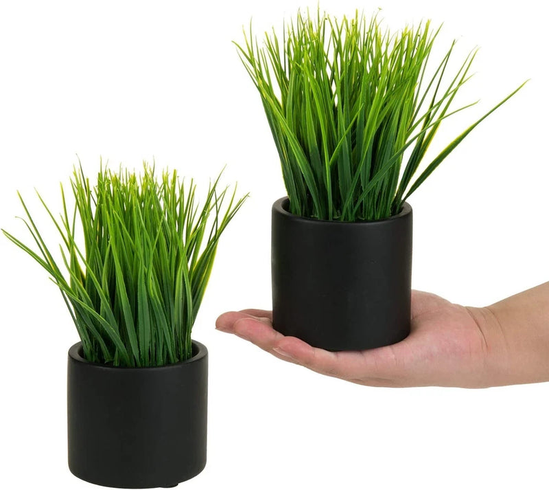 Pack of 2 artificial grass plants in round black cement pots, green blades