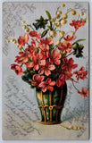 Greetings~Vase Of Lily Of The Valley & Pink Flowers~Postmarked~Emb~Vtg Postcard Lily
