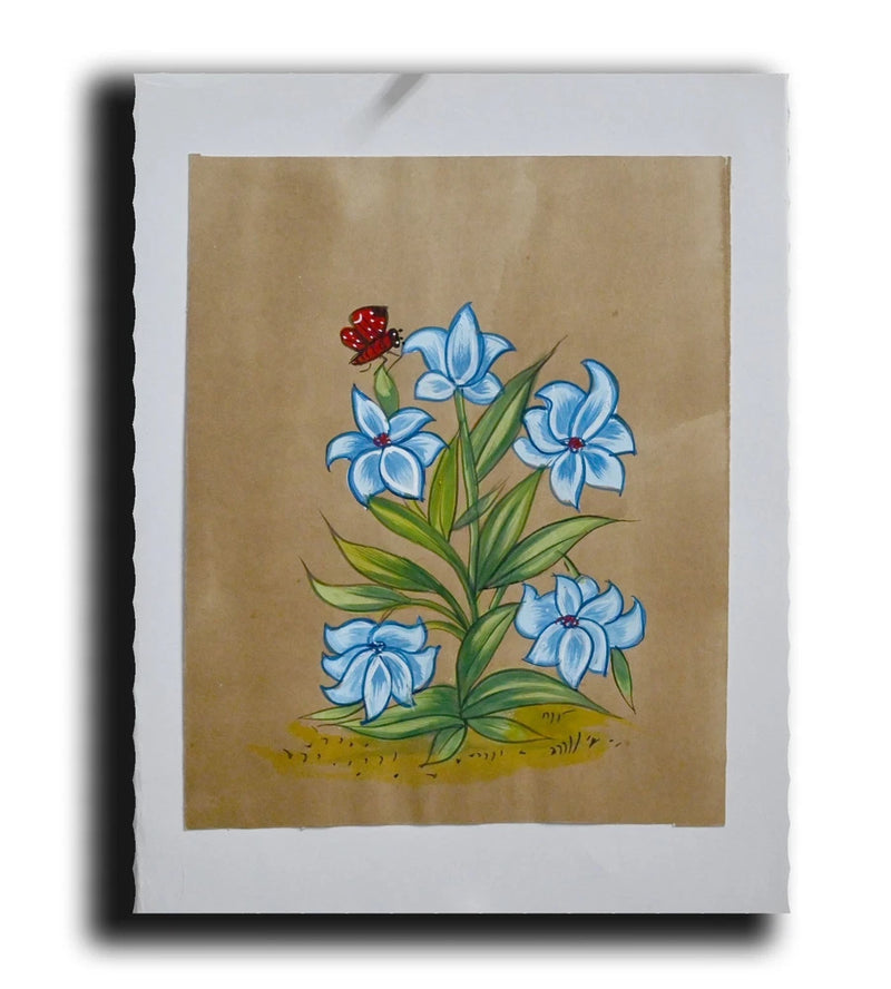Miniature floral painting with blue lily flowers, green leaves, and small red ladybug