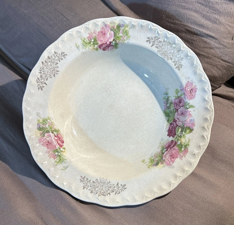 Decorative ceramic bowl with floral carnation roses and silver rim trim