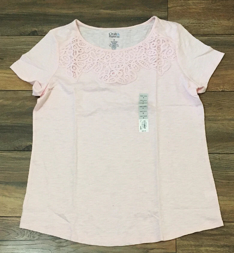 Light pink short-sleeve T-shirt with lace overlay around the neck