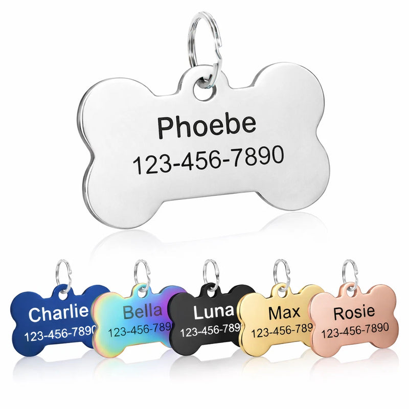 Stainless steel bone-shaped dog ID tags with engraved names and phone numbers