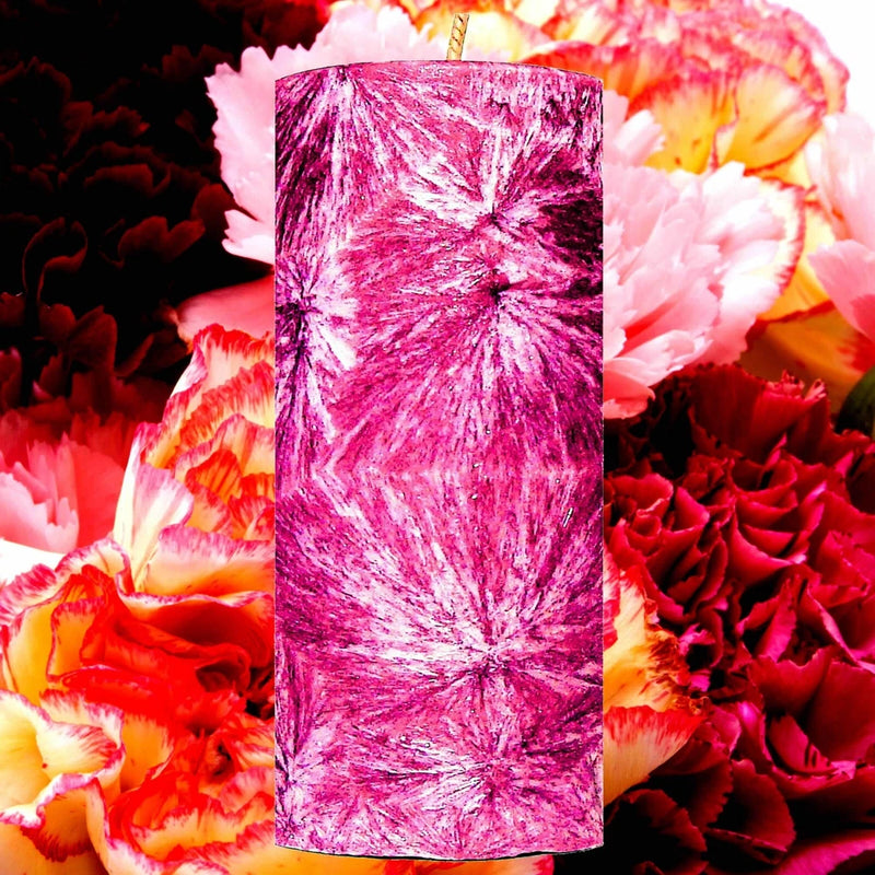 Marbled purple and pink pillar candle with a visible top wick