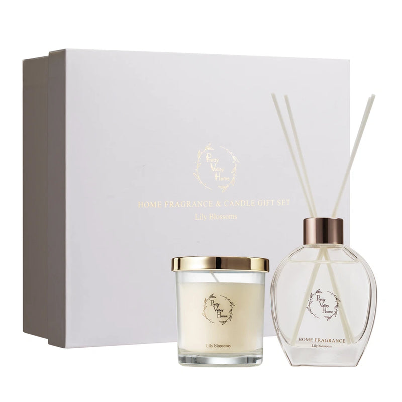Gift box set with white candle jar and clear reed diffuser bottle