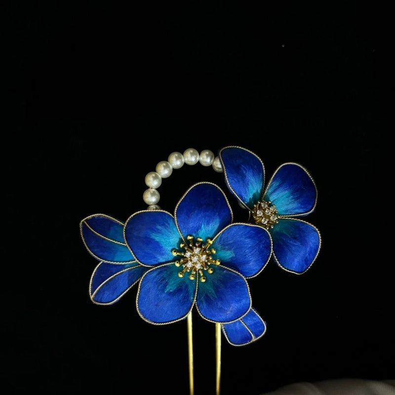Blue silk flower hair comb with pearl bead strand and gold prongs