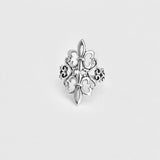 Silver fleur-de-lis statement ring with detailed filigree design
