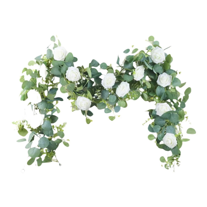 Artificial green vine garland with faux roses and hanging leaves