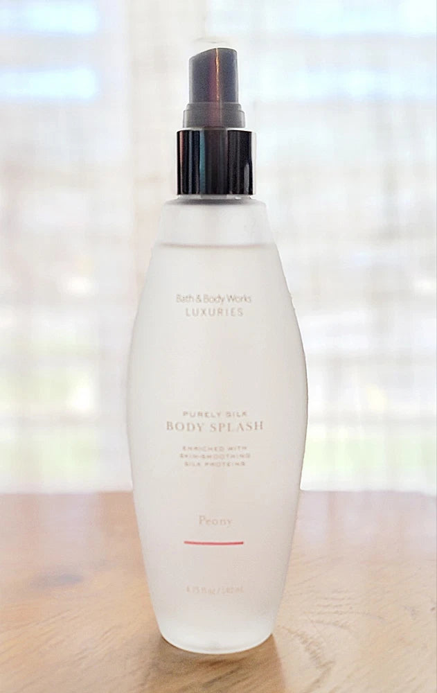 White frosted body splash bottle with black spray cap, Bath & Body Works Luxuries