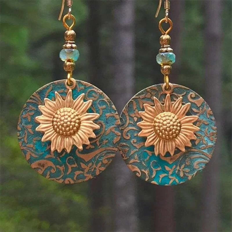 Sunflower dangle earrings with turquoise floral patterned round drops and gold-tone hooks