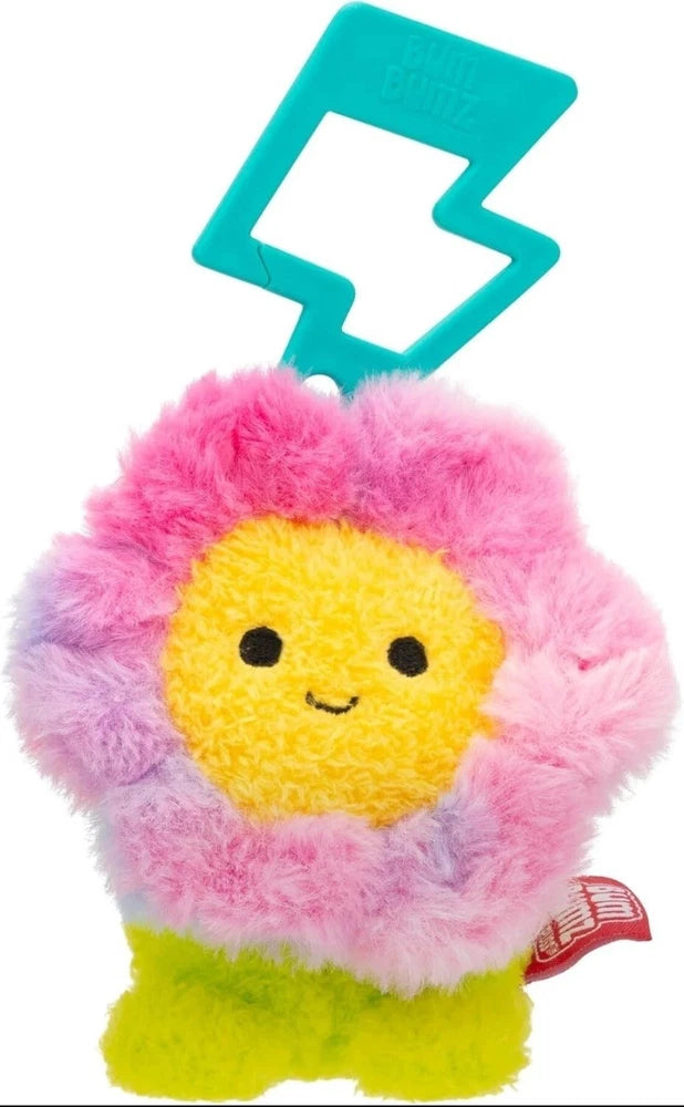 Plush sunflower keychain with pink fuzzy petals, yellow face and center, hanging blue tag