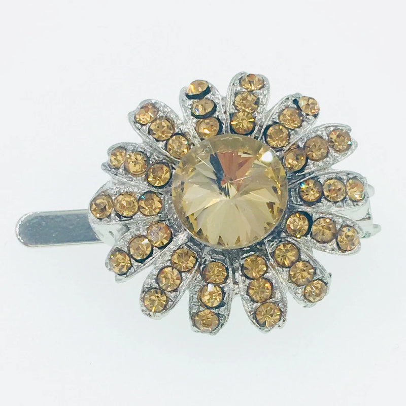 Rhinestone sunflower hair clip with crystal center on silver barrette backing