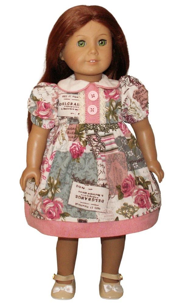 Pink rose print doll dress with Peter Pan collar, puff sleeves, and gathered skirt