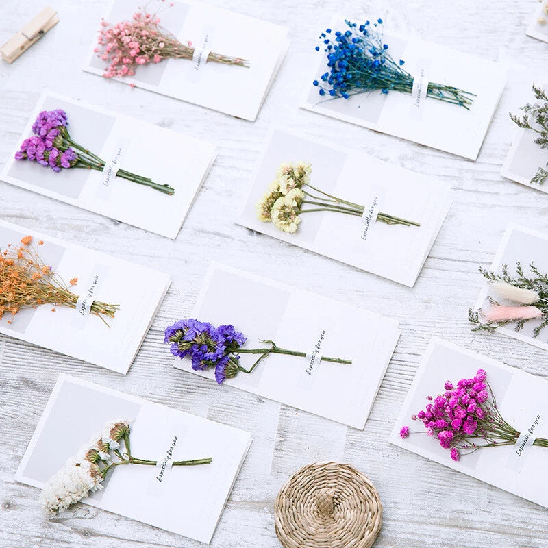 Set of dried flower greeting cards with small bouquet on twine, white envelopes