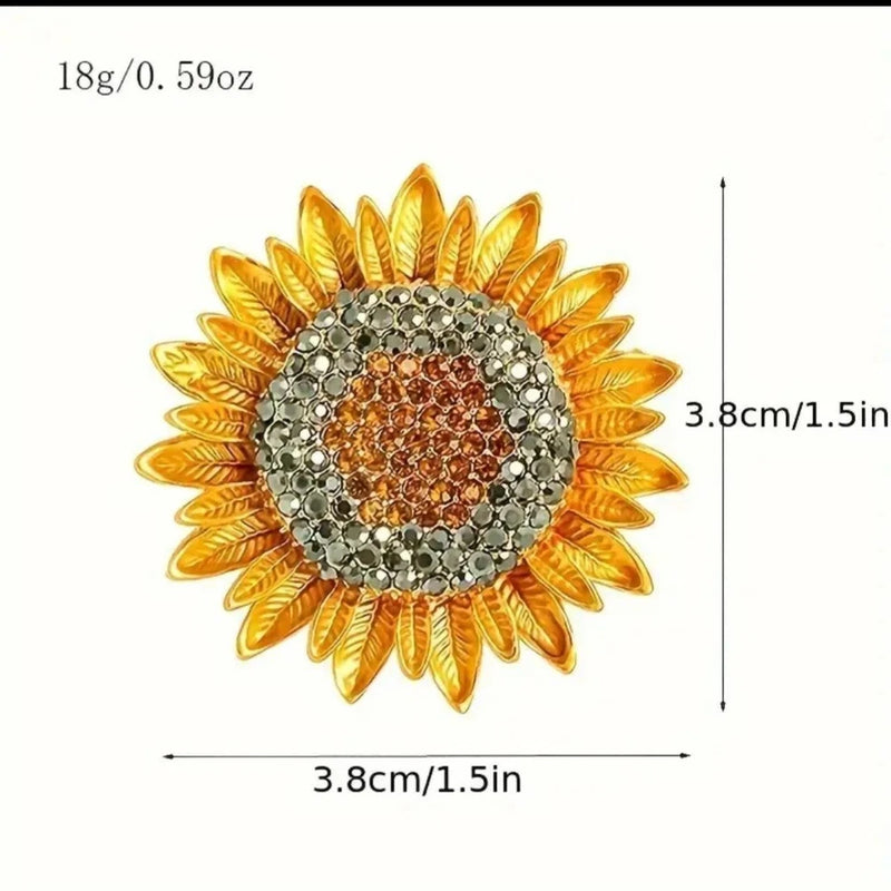 Sunflower rhinestone lapel pin with gold petals and silver crystal center, round backing