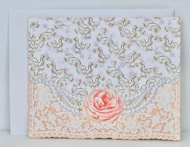 Floral note card with lace border, pale pink rose and pearl-like accents