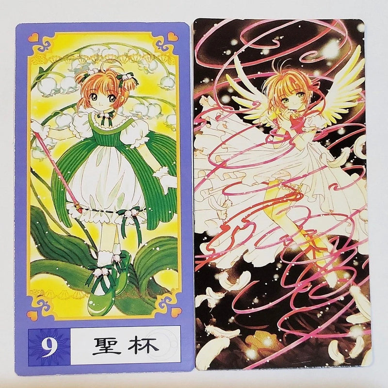 Anime tarot trading card #9 with girl in white and green, floral lily border