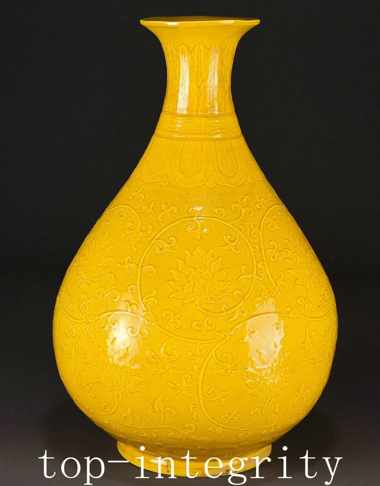 Yellow glazed porcelain flower bottle vase with embossed scrolling peony pattern
