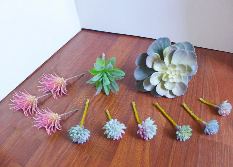 Set of 11 artificial miniature succulents with small lotus flower heads, green and purple