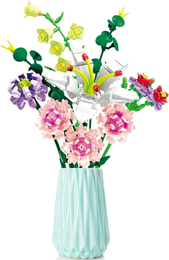 Artificial carnation building-block bouquet with pink flowers, green leaves, in blue vase