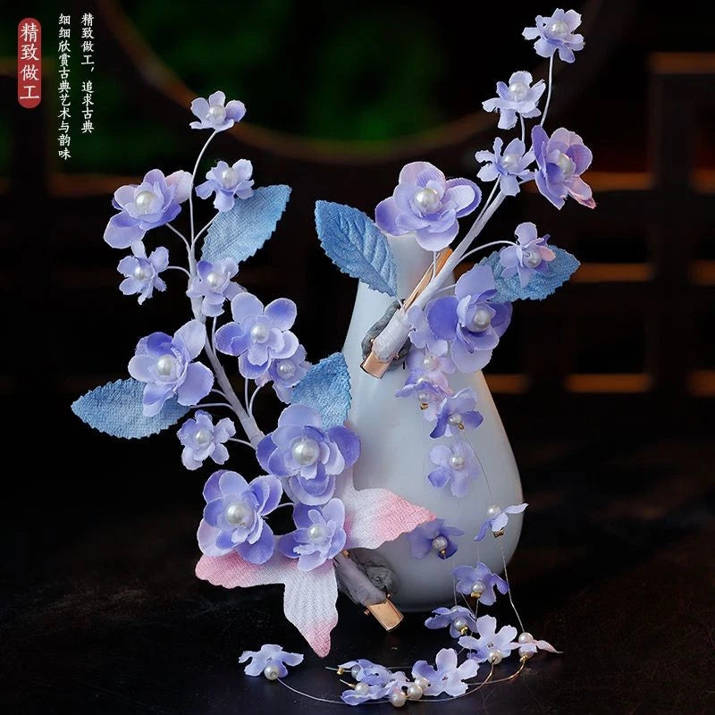 Purple floral butterfly tassel hairpin with pearl-like bead details