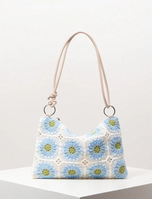 Sunflower crochet knit purse with blue flower pattern and beige shoulder handles