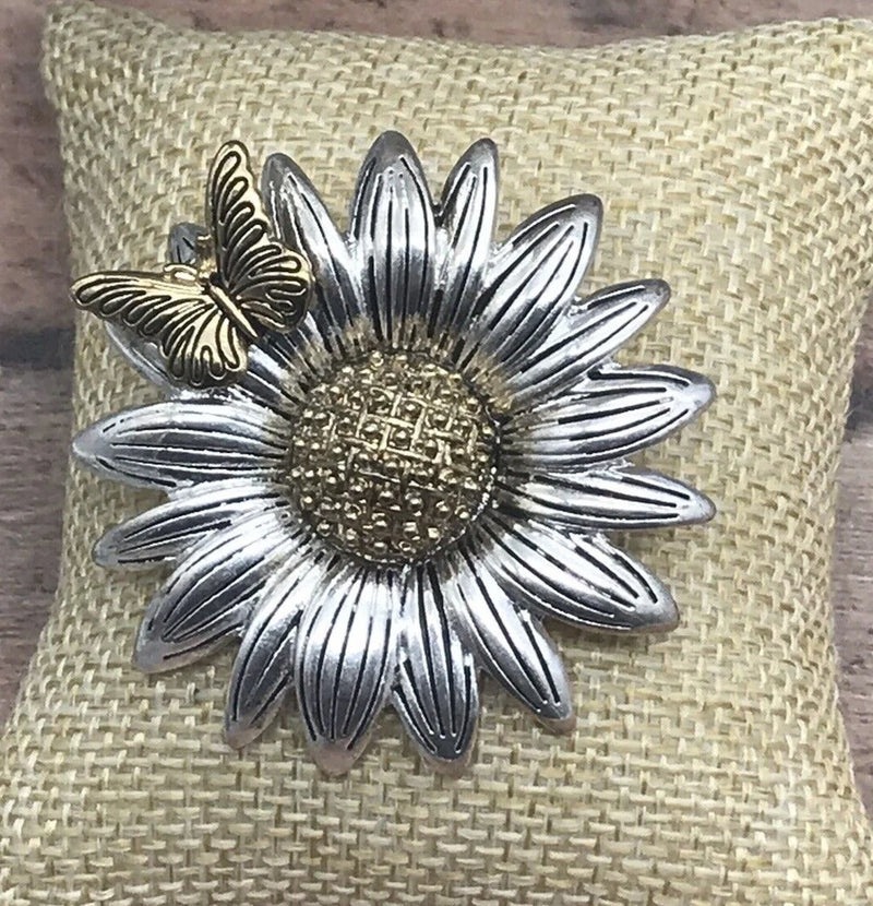 Two-tone sunflower brooch with butterfly, silver petals and gold textured center
