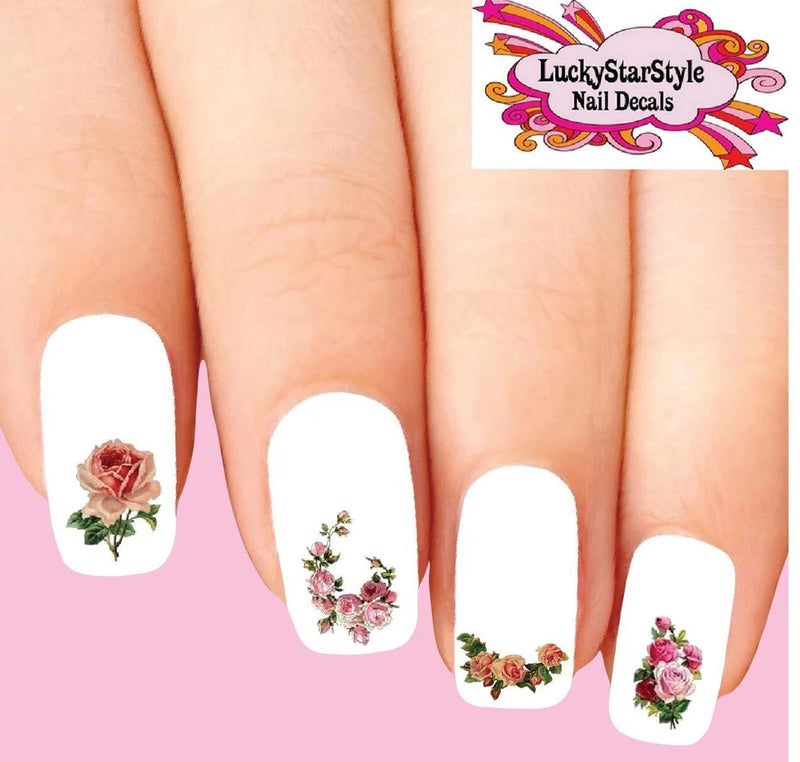 Waterslide nail decals: pink rose & green leaf designs on white nails