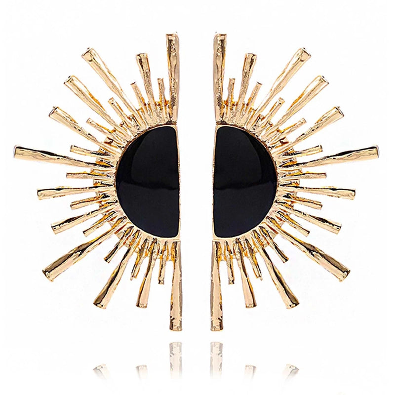 Large sunflower statement earrings with black teardrop centers and gold spiked rays