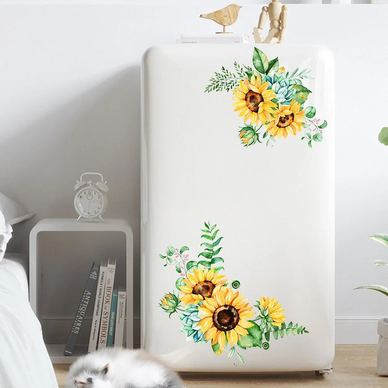 Sunflower wall decal set with two bright blooms, green leaves, and small flowers on white surface